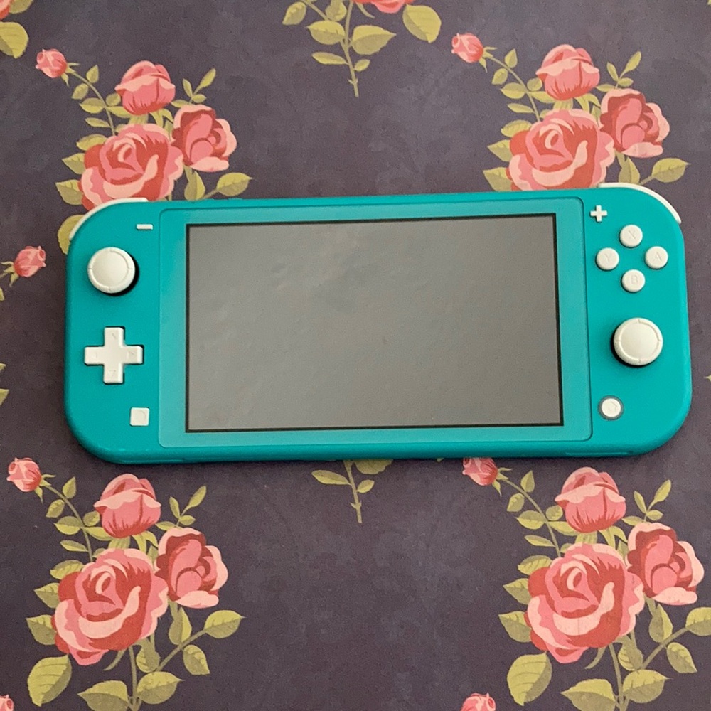 Nintendo switch lite + games